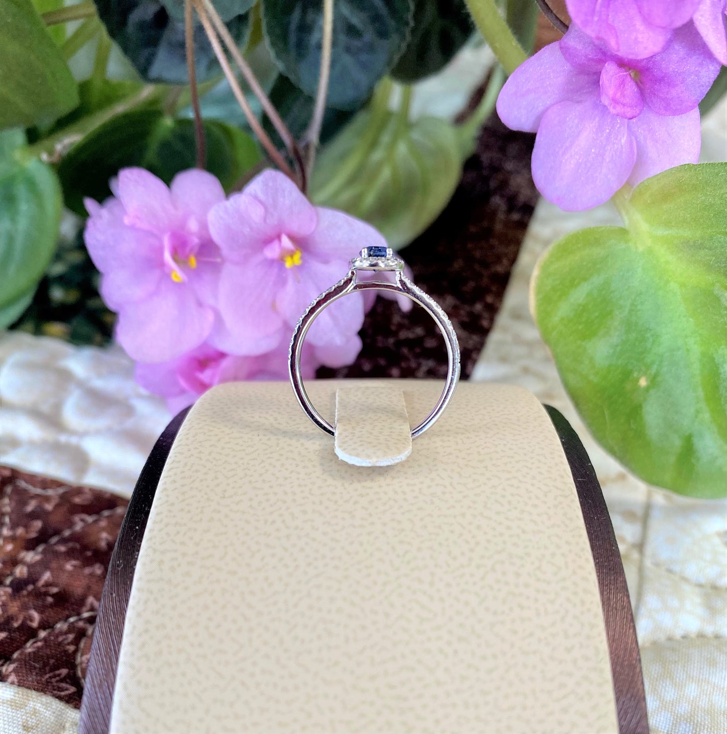 Yogo & diamond halo ring - 1/2ct oval Yogo/ 1/5ct diamonds